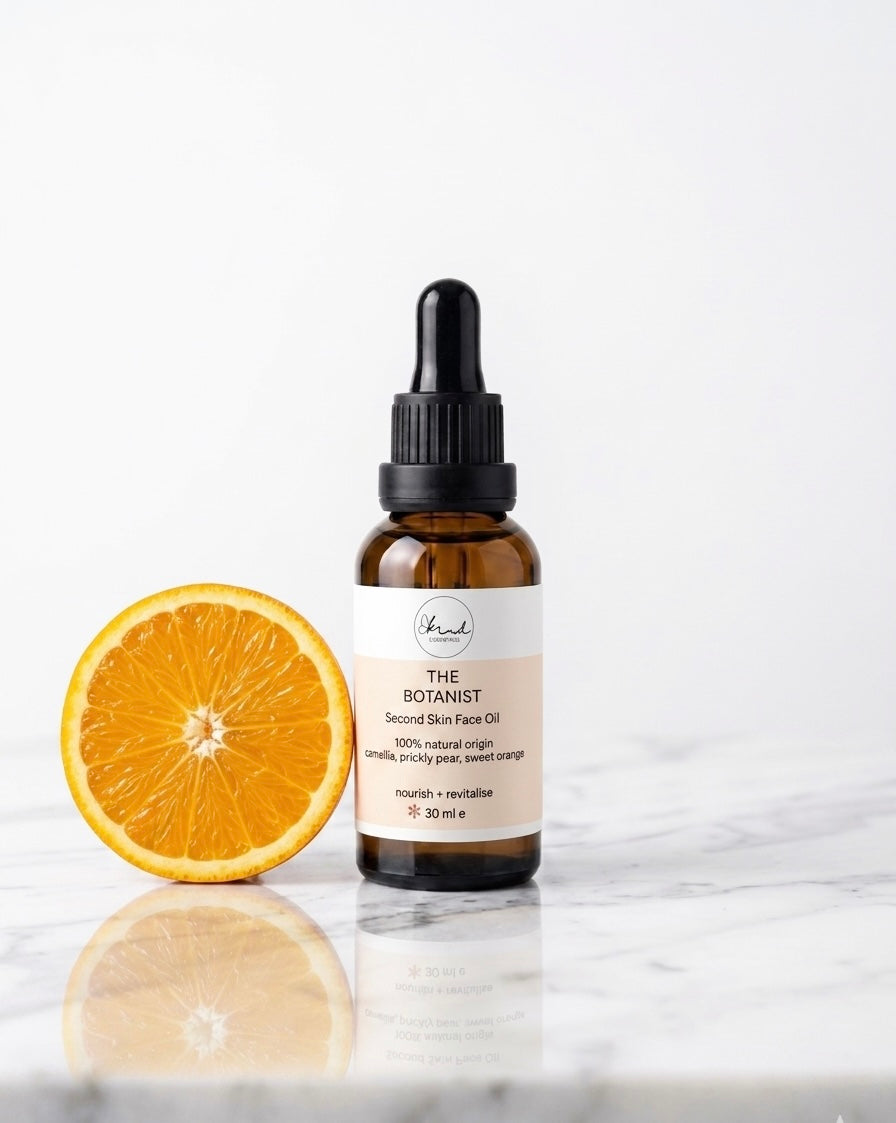 Kind Essentials The Botanist Second Skin Face Oil on a marble top