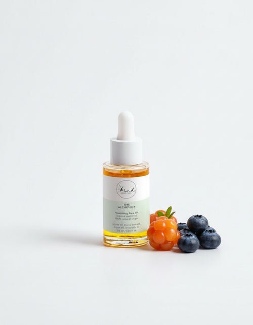 Kind Essentials The Alchemist Nourishing Face Oil on a marble top